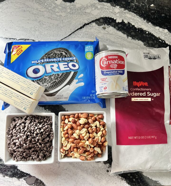 easy homemade buster bar ice cream dessert recipe, The ingredients for the Buster Bar recipes include Oreo cookies evaporated milk powdered sugar butter chocolate chips and Spanish peanuts