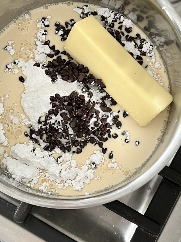 easy homemade buster bar ice cream dessert recipe, Ingredients for the chocolate sauce in a saucepan on a stovetop
