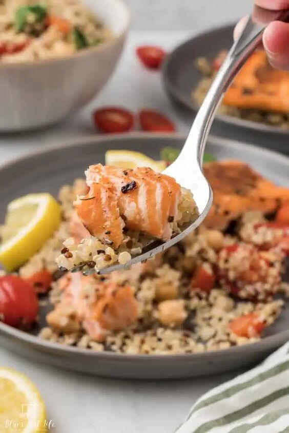 salmon quinoa salad with lemon dressing, A fork with a bite of salmon quinoa salad
