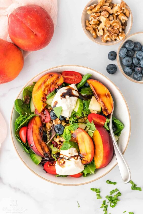 grilled peach and burrata salad with balsamic, A serving bowl with grilled peach and burrata salad