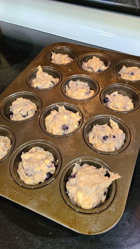 the best banana blueberry muffins recipe, Muffin batter inside a muffin tin