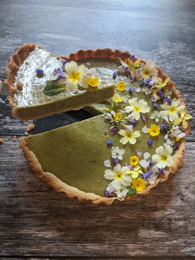 cutting a slice of lemon nettle tart
