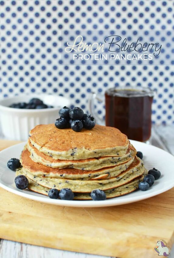 best protein powder pancakes lemon blueberry, Lemon blueberry protein pancakes on a plate next to syrup