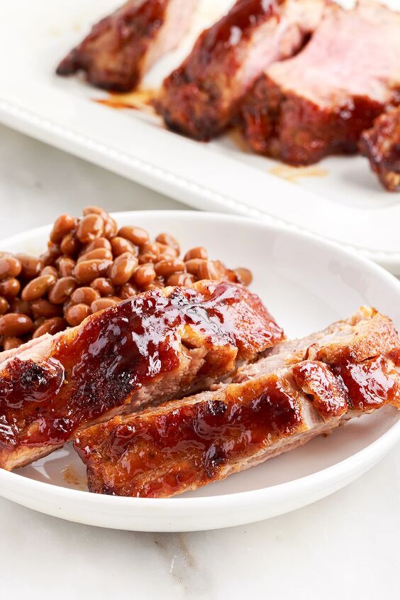 the 20 minute air fryer ribs you ll be craving, plated bbq ribs served with baked beans