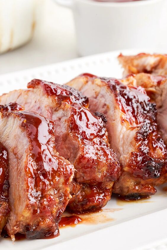 the 20 minute air fryer ribs you ll be craving, side view of ribs stacked in a row