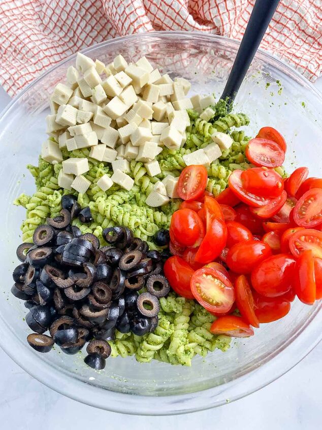 vegan pesto pasta salad, Bowl of pesto pasta salad ingredients before mixing together