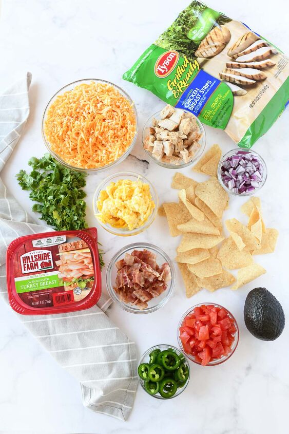 hearty breakfast nachos, Breakfast Nachos ingredients on a white table