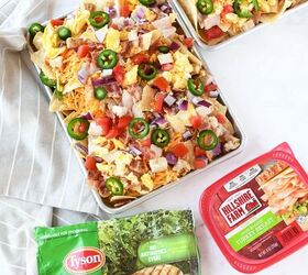 hearty breakfast nachos, Two sheet pans of nachos near Tyson and Hillshire Farms products