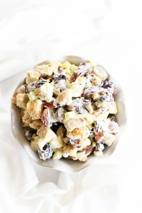 chicken salad with grapes cranberries walnuts, Chicken Salad with Grapes and walnuts in a white dish with a white napkin