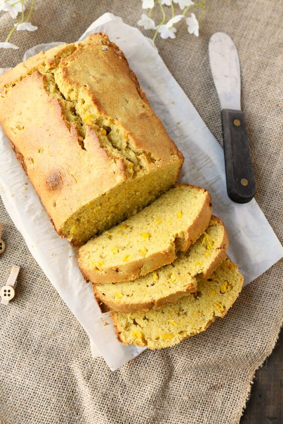 perfectly moist and sweet cornbread with real corn, Sliced Sweet Cornbread loaf with real corn on burlap