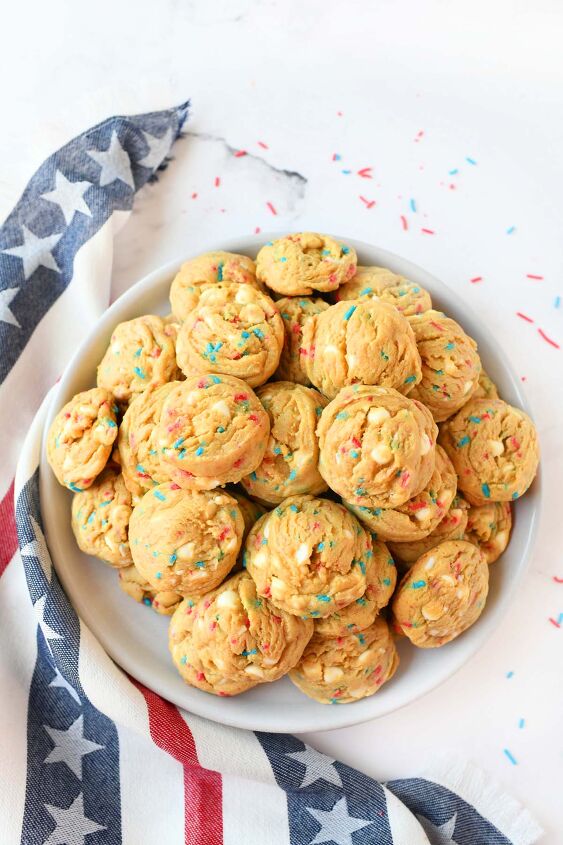 red white and blue sprinkle pudding cookies, A plate of golden brown patriotic pudding cookies