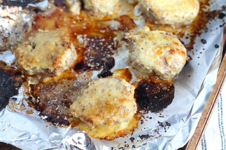 crusted parmesan pork tenderloin, Parmesan Pork Tenderloin pieces on a pan They are juicy salty and slightly cheesy It s easy to make in the oven so you can enjoy it at home anytime