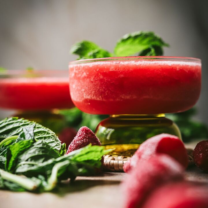 fresh watermelon vodka cocktail with basil, fros with mint and strawberries