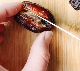 peanut butter stuffed dates, a medjool date with a slit cut down the middle to remove pit