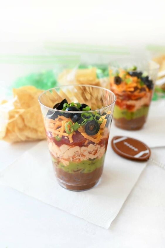7 layer game day individual dip cups, 7 Layer dip cup serving on a Vanity Fair white napkin