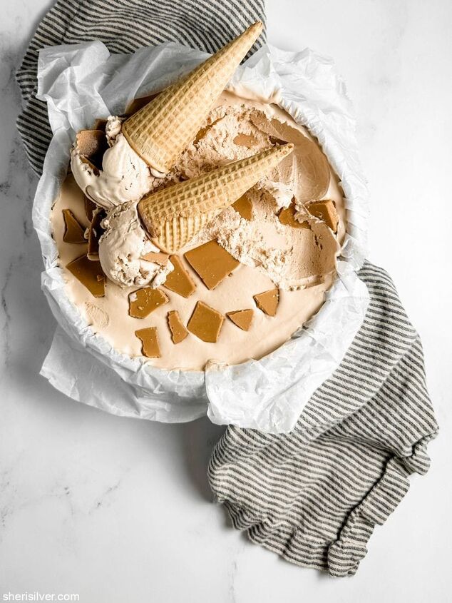 easy coffee malt roasted white chocolate ice cream, coffee malt ice cream scoops on sugar cones in a vintage tin of ice cream set on a striped linen napkin