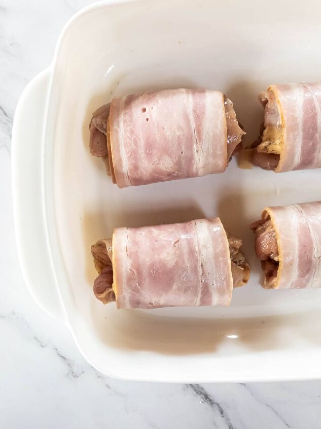 bacon wrapped chicken thighs in the oven so easy, Bacon wrapped chicken thighs ready to go in the oven in baking dish