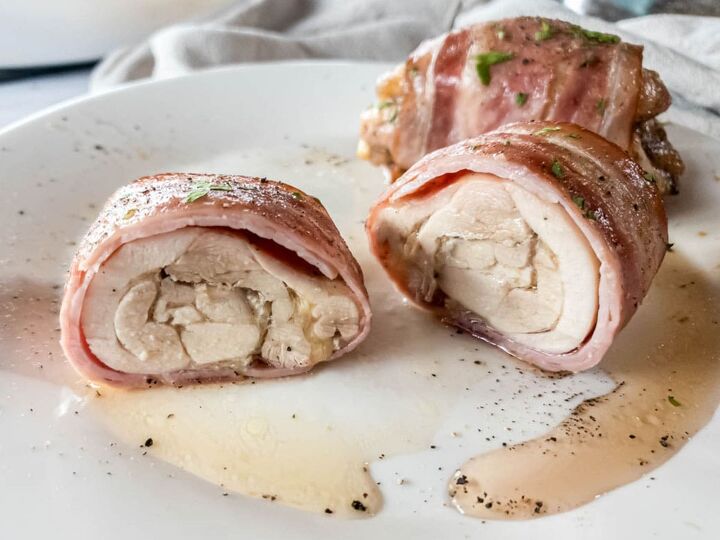 bacon wrapped chicken thighs in the oven so easy, Served bacon wrapped chicken thighs cut open in half