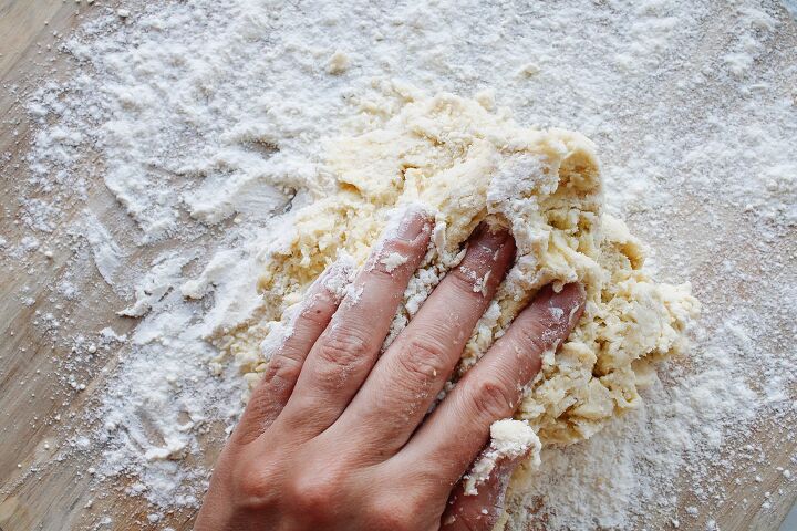 honey scones, honey scone dough being kneaded by hand