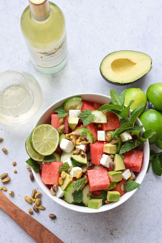 watermelon and cucumber salad, Watermelon cucumber and feta salad recipe in a white bowl with wine