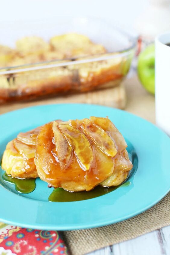 overnight french toast bake with apples, French Toast topped with apples on a plate with the rest in the background in a dish
