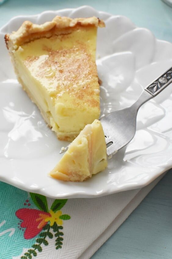 custard pie recipe with an easy crust, slice of custard pie on white dish