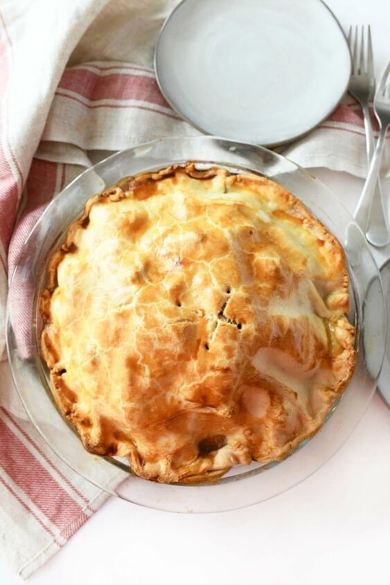 easy apple pie using store bought crust, Golden brown baked apple pie near a red and tan napkin
