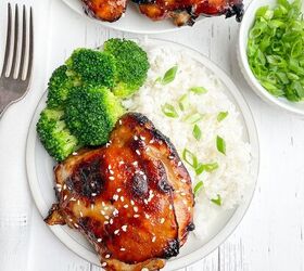 oven baked teriyaki chicken thighs boneless or bone in, air fryer teriyaki chicken thigh on a white plate with white rice and broccoli
