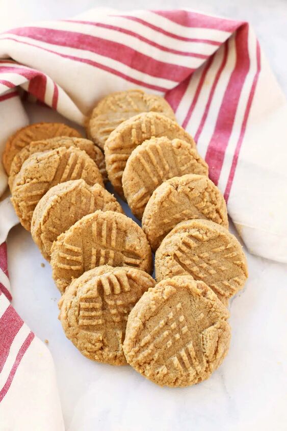 super easy 3 ingredient peanut butter cookies recipe, 3 ingredient peanut butter cookies on a white table with a napkin
