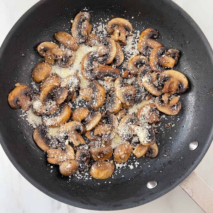 red robin inspired mushroom swiss burger recipe, Parmesan cheese on cooked mushrooms
