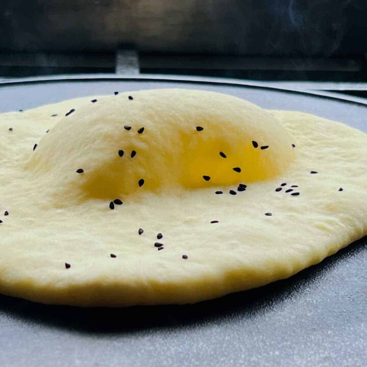 homemade naan recipe easy no knead recipe video, topped with nigella seeds