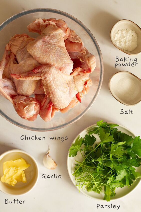 garlic butter chicken wings oven baked and super crispy, All ingredients laid out on a white background
