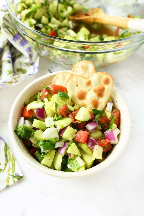 garden fresh cucumber salsa, A small white bowl with cucumber salsa and heart shaped crackers