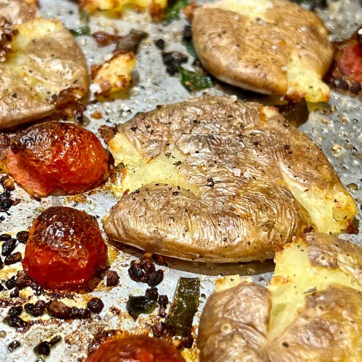 the crispiest air fryer smashed potatoes, Garlic herb smashed potatoes on a sheet pan