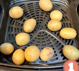 the crispiest air fryer smashed potatoes, Mini golden potatoes in an aibfryer basket