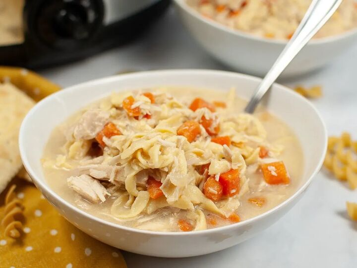 slow cooker turkey noodle soup, white bowl of turkey noodle soup
