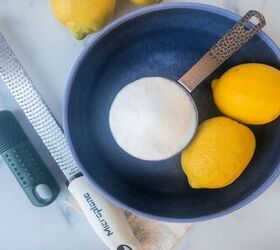 how to make lemon sugar to flavor desserts and drinks, A blue bowl with sugar and lemons with a Microplane citrus grater