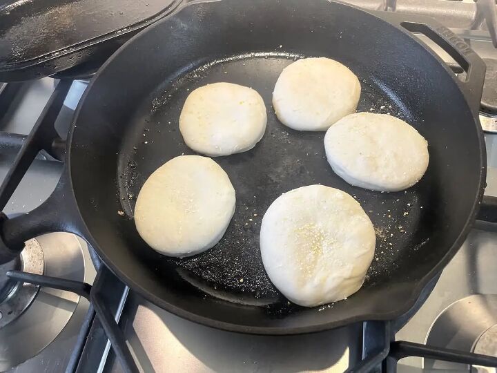 easy sourdough english muffins, sourdough English muffins in cast iron skillet