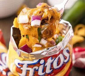 no plate needed when you make walking frito pie, angled down view inside individual sized fritos bag willed with frito pie