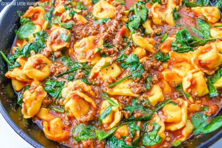 italian sausage tortellini skillet, Close up of Sausage Tortellini Skillet in a large cast iron pan