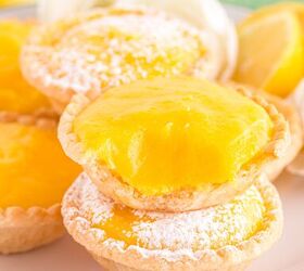 easy mini lemon tarts, Bite out of lemon tart on table