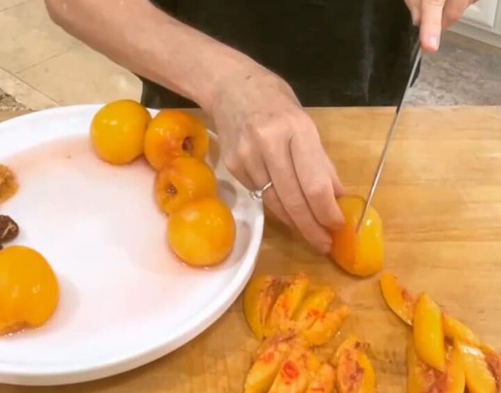 how to make a spectacular peach pie the easy way, slicing parboiled peaches for a homemade peach pie filling