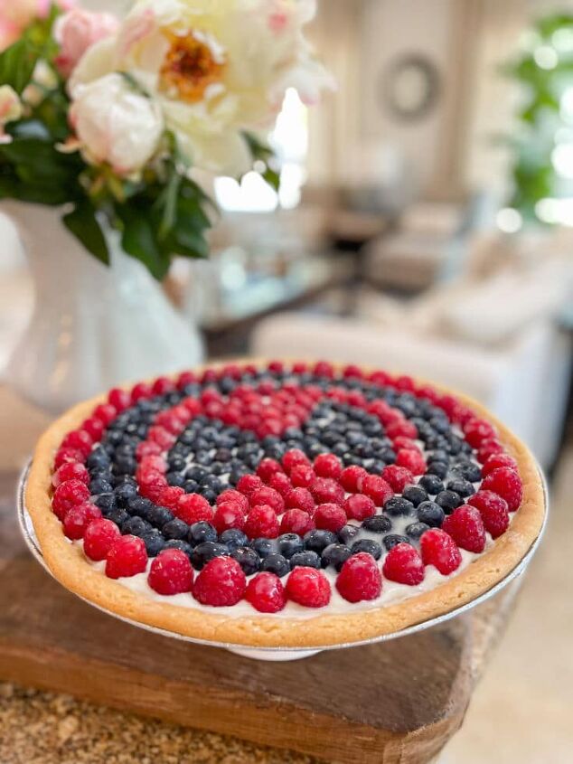 how to make a spectacular peach pie the easy way, fruit pizza with lemon glaze features a sugar cookie crust cream cheese icing then topped with strawberries and blueberries