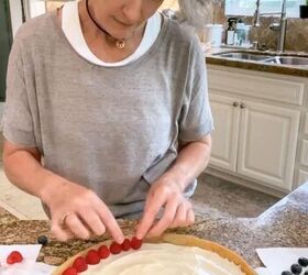 how to make a fresh and fulfilling fruit pizza with lemon glaze, arranging fruit on a sugar cookie pizza crust topped with cream cheese icing