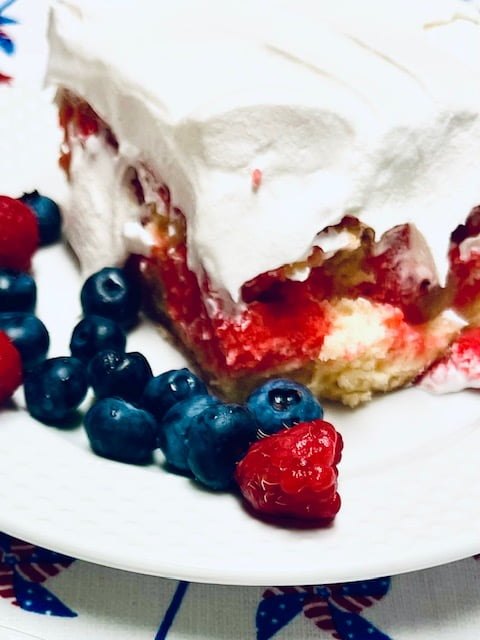 gluten free raspberry poke cake, Picture of finished cake and berries