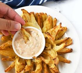 https://cdn-fastly.foodtalkdaily.com/media/2023/07/28/6935860/make-an-air-fryer-onion-blossom-at-home.jpg?size=1200x628