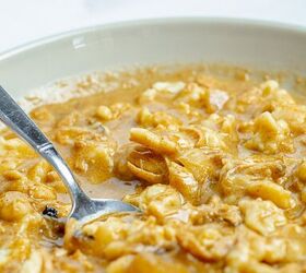 how to make the most amazing chicken paprikash soup in 30 minutes, close up of a bowl with a spoon full of chicken and spaetzels