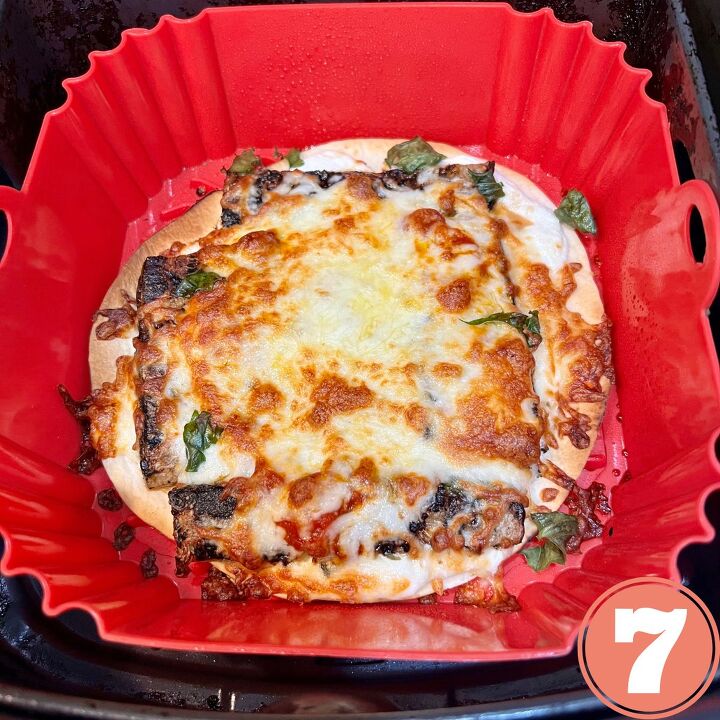 crispy air fryer tortilla pizza, A crispy veggie air fryer pizza in a red silicone basket
