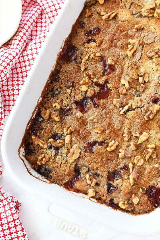 fall cranberry apple dump cake, Cranberry Apple Dump cake with walnuts on it in a white pan