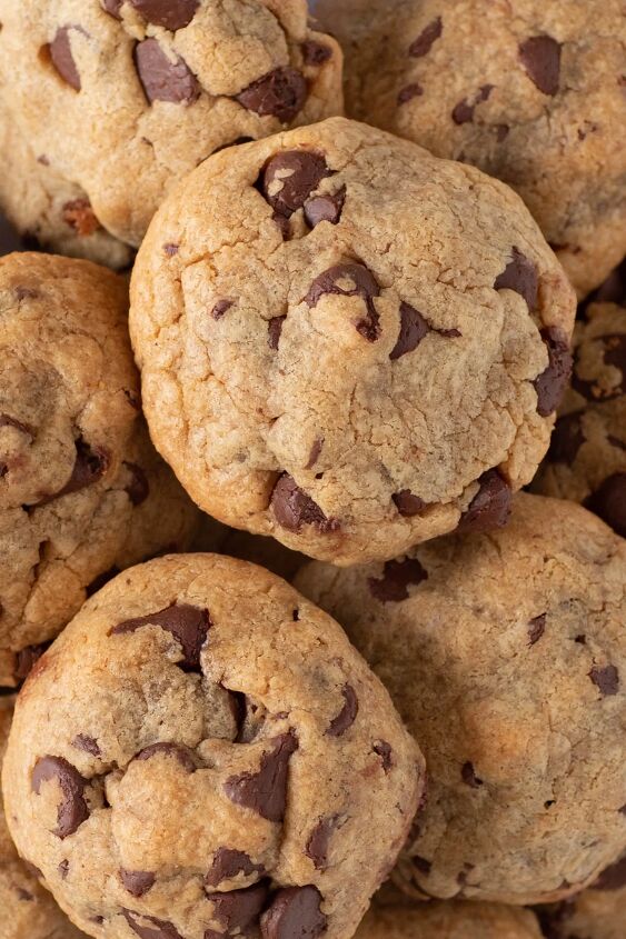 this 4 ingredient chocolate chip peanut butter cookie will be your fav, up close view of plate of thick 4 ingredient chocolate chip cookies